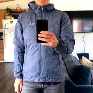 Rab wind shell size medium, packs into its pocket.